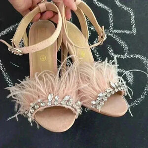 Truffle couture peach suede heels with feathers and stones